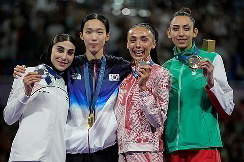 Women's 57kg Taekwondo: Iran's Nahid Kiyanichandeh (Silver), Korea's Kim Yujin (Gold), Canada's Skylar Park (Bronze), and Bulgaria's Kimia Alizadeh Zenozi (Bronze)